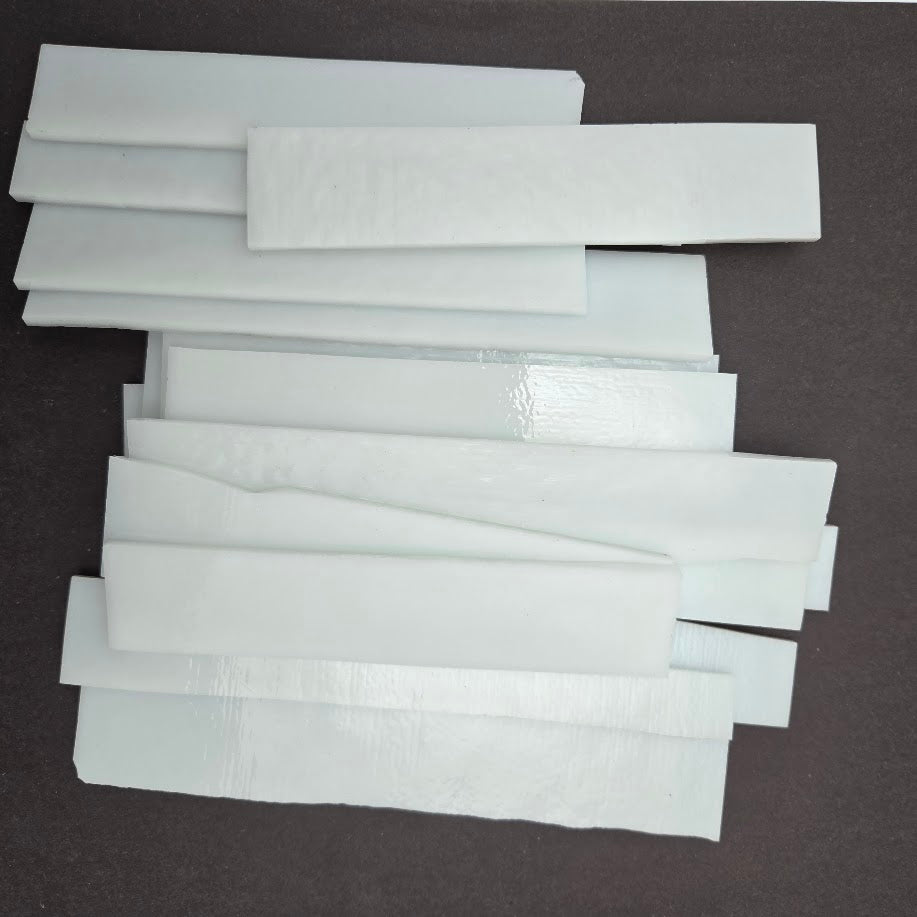 90 COE One Pound of Tekta White Cut-offs Strips Scrap- 